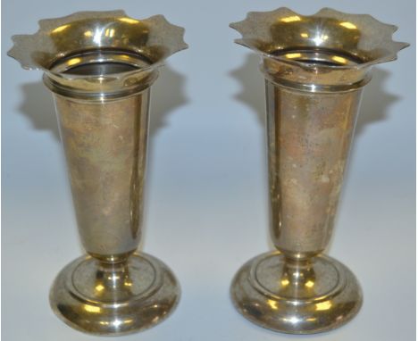 A pair of George V silver mantel vases, shaped flared rims, domed circular bases, 14cm high, Deakin & Francis, Birmingham 191