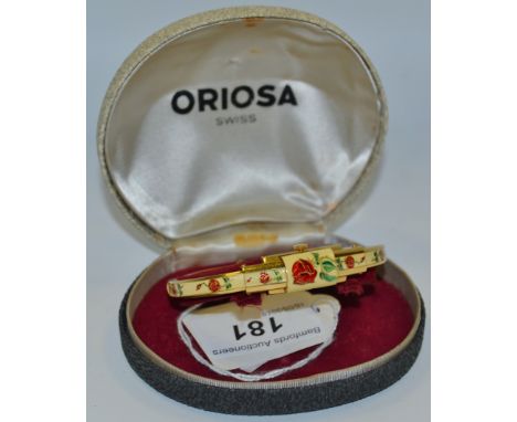 An unusual lady's bangle watch, a Swiss 17 jewel mechanism the hinged bangle manufactured by Lunette, gold plated and French 