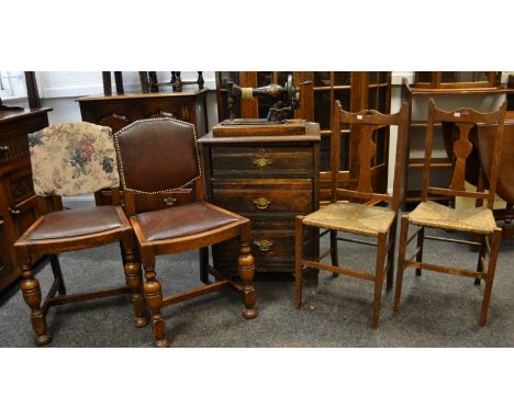 Furniture - a Singer sewing machine; a George III oak bank of three long drawers, pierced brass escutcheon, drop swan neck ha