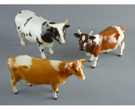 THREE BESWICK POTTERY CATTLE to include a first version Jersey cow, an Ayrshire bull 'Champion Whitehill Mandate' and an Ayrs