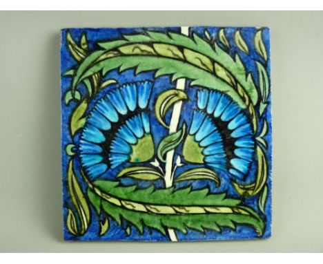 WILLIAM DE MORGAN NEAR 8 ins SQUARE TILE with floral and leaf decoration in typical form on a blue ground, impressed to the r