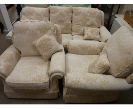 A BRIDGECRAFT QUALITY THREE PIECE LOUNGE SUITE comprising three seater settee and two armchairs, having curved end arms and u