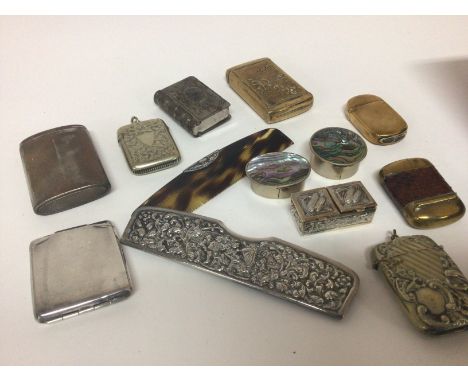 A silver cased comb small silver box Serling silver match case and a collection of brass and silver plated vestas.