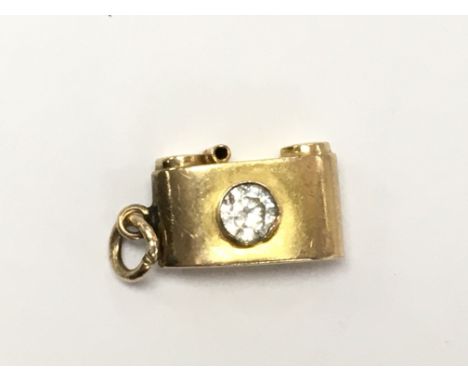 A 9ct gold camera charm , 1g approximately. Postage category A