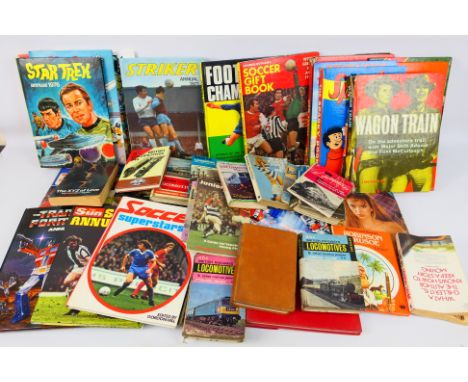 A collection of vintage annuals relating to football, locomotives, Star Trek, and similar. Ranging from the 1960s/70s/80s. (T
