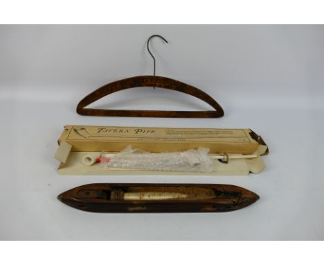 Lot to include a boxed wooden smoking Tavern Pipe. A vintage wooden weaving shuttle holder. Also included within the lot is a