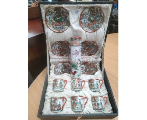 1900s Oriental ghiesha scene tea service in fitted case together with oriental vase . 