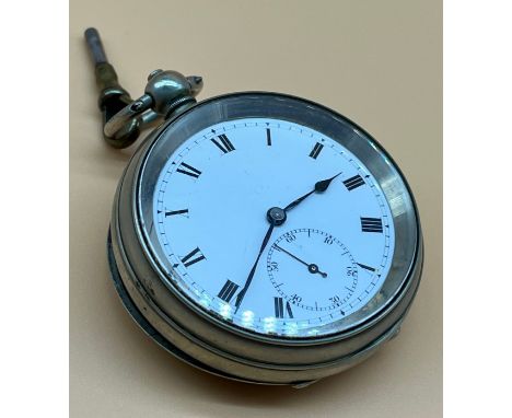 Antique pocket watch fitted within a nickel case, Enamel face. Swiss made New Magnetic. Comes with a key. [Non-Runner- needs 