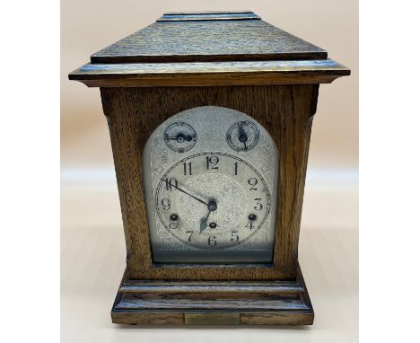 Antique oak cased bracket clock, Movement by Kienzle- German made, Comes with key and pendulum. [40cm high] [Runs for a short