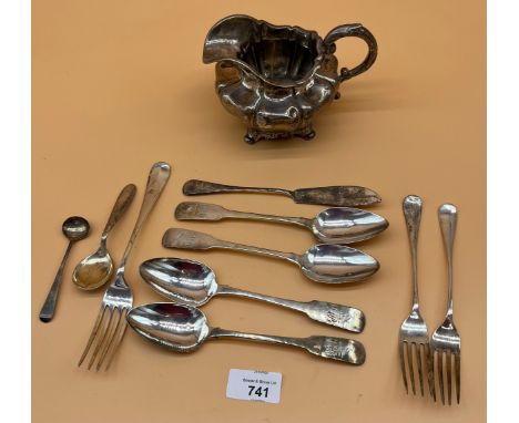 Collection of antique silver flatwares and cream jug. Includes Victorian London silver cream jug dated 1838, Chester, Dublin 