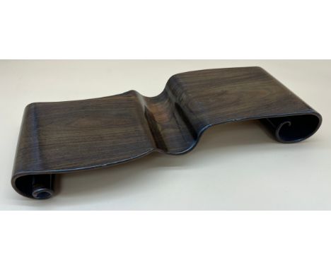 Antique Chinese large Hongmu scroll form stand. Qing Dynasty, 19th century. Cut from one piece of wood with scroll ends, the 