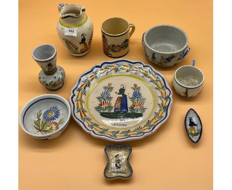 Quantity of Quimper tin glaze items includes bowls, mugs and plate. 
