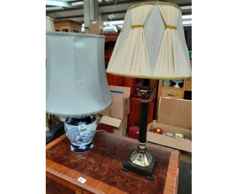 Contemporary Corinthian column table lamp together with oriental blue and white table lamp. 