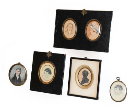 A Regency portrait miniature of a gentleman in an oval metal frame, together with a double framed portrait miniature named ve