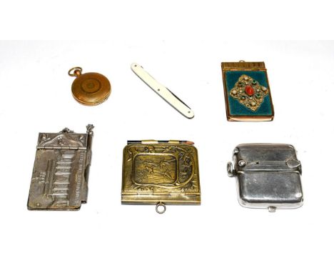 A collection of items, including: a silver combination vesta, cigar cutter and coin holder, Birmingham, 1900, (a.f.); three a