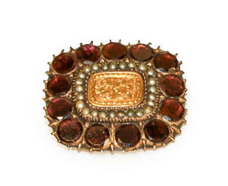 A 19th century garnet and split pearl brooch, measures 2.5cm by 2.2cm .  Gross weight 6.5 grams. 