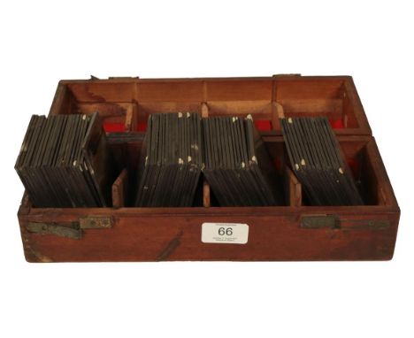 Glass lantern slides, a set of sixty-five glass lantern slides, mainly photographic and depicting views, street scenes, works