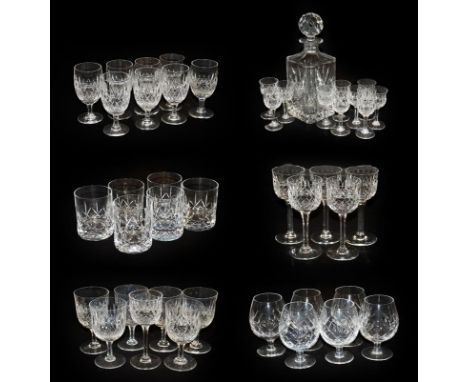 A suite of Thomas Webb cut glass comprising a decanter, six whisky tumblers, six white and six red wines, eight port and ten 