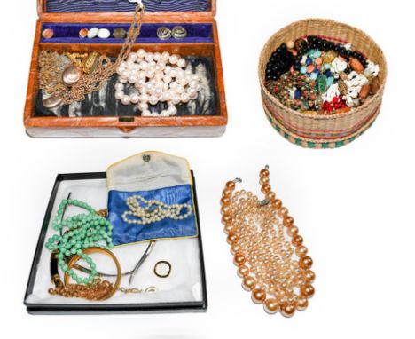 A ropetwist necklace stamped '375'; a pair of 9 carat gold earrings; a bean pendant; a locket; a cultured pearl necklace; and