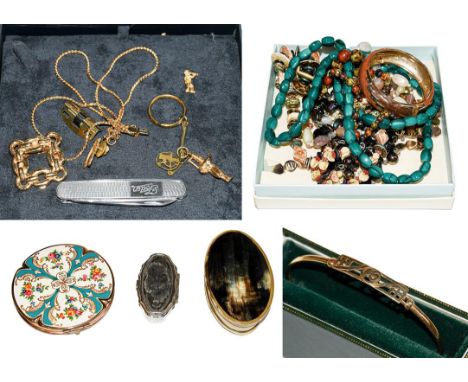A pair of 9 carat gold cufflinks; a malachite pendant on a 9 carat gold chain; a shell cameo brooch, stamped '9CT'; a gilt sh