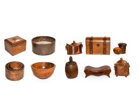 A Georgian mahogany tea caddy, a large treen bowl, a nest of wooden measures and a quantity of other wooden items and treen, 