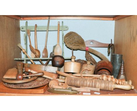 A quantity of Victorian and later kitchenalia, mostly wooden items including painted spoon rack and utensils, thermometer, br