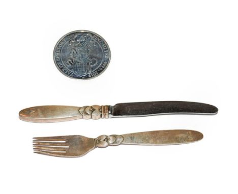 A Danish silver knife and fork, by Georg Jensen, Copenhagen, Post 1945, Cactus pattern, engraved with initials, the knife wit