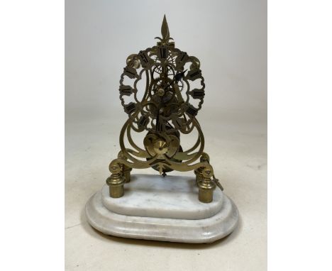 A Brass skeleton clock on marble base with pendulum and key. With fussee movement.H:34cm