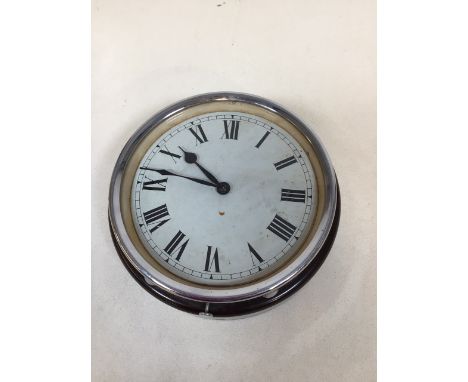 A Bakelite wall clock with a Smiths Motor Accessories Ltd mechanism. Untested but is ticking W:18cm x D:6cm 