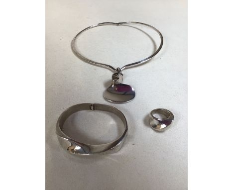 A heavy silver choker, bangle and ring. Ring stamped 3528 &amp; 925, bangle stamped 3528 and choker stamped 3528 &amp; 925. T