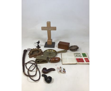 A wooden crucifix on metal decorative stand, wooden boxes, an ormolu stand, leather pipe cases, a whip, a fishing line and ot