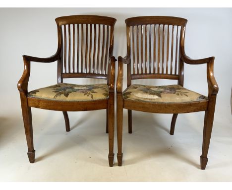 A pair of Empire style early 20th century light oak armchairs with fluted legs.W:55cm x D:58cm x H:100cm