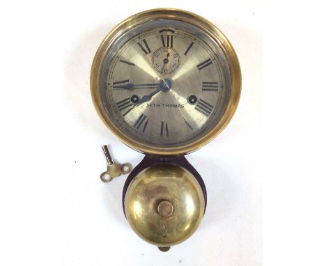 AN ANTIQUE SHIPS BELL CLOCK, Seth Thomas brass framed ships Bell clock with silvered face & secondary dial with lower bell st