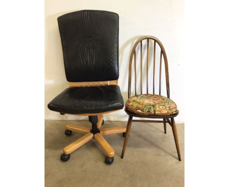 An Ercol stick back dining chair also with a modern faux leather revolving up and down office chair. 