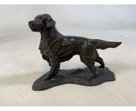 A Resin figure of a hunting dog.W:23cm x D:9cm x H:17cm