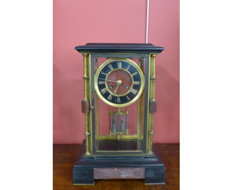 A 19th Century French Achill Brocot Belge noir and four sided glass mantel clock