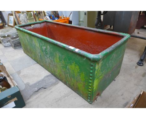 A riveted steel trough