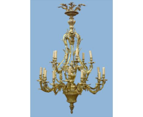 A large French rococo style gilt metal eighteen branch chandelier