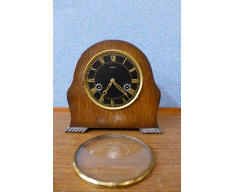 A Smiths oak mantel clock