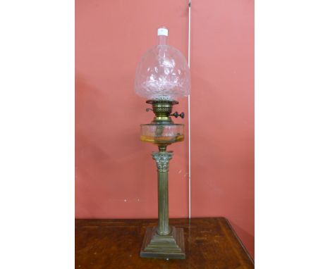 A Victorian Corinthian column brass oil lamp