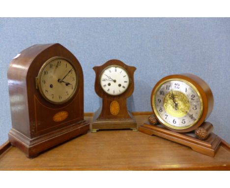 Two Edward VII inlaid mahogany mantel clocks and another