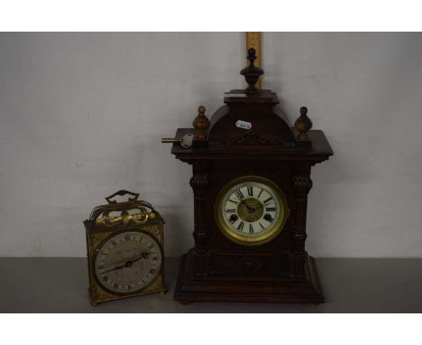 An early 20th Century oak cased mantel clock and a further brass cased mantel clock