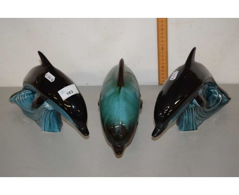 Two Poole pottery model dolphins and a Glue Mountain model dolphin (3)