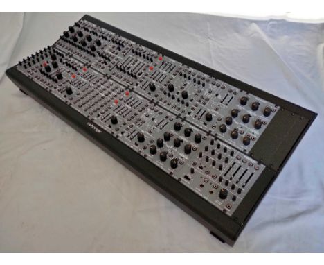 A Behringer Eurorack Go Powered Case, fully assembled with System 100 Modules - The system 100 modules have been bought separ