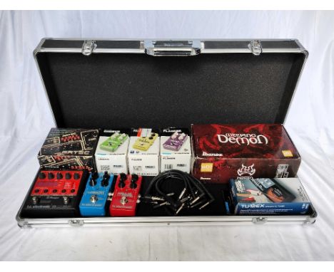 A Collection of Guitar Pedals with Hard Case including an Artec Power Brick boxed complete with manual and accessories, power