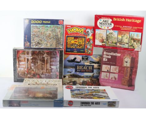 Collection of mixed  puzzles, including,1000pc airfix through the ages by Gibsons, jumbo 2000pc sealed, Ravensburger sealed 3