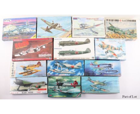 Twenty-nine 1:72 scale Japanese and W.W.II P.40 fighter model kits, thirteen Japanese fighters include Hasegawa Rising Thunde