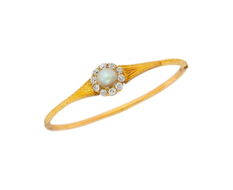 One pearl ap. 7.6 mm., 10 old-mine cut diamonds ap. 1.00 ct., c. 1900, ap. 8 dwts. Inner cir. 6 3/4 inches. The pearl has not