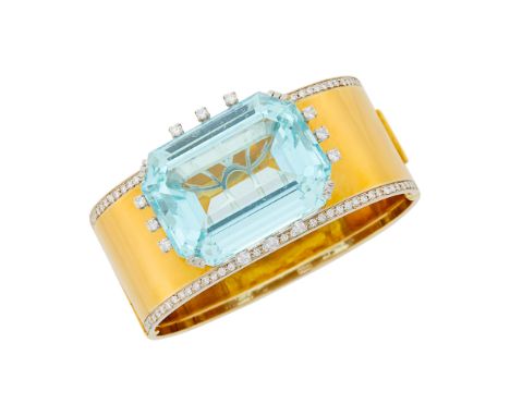 18 kt. yellow and white gold, one cut-cornered step-cut emerald-cut aquamarine ap. 90.00 cts., 12 round diamonds ap. .70 ct.,