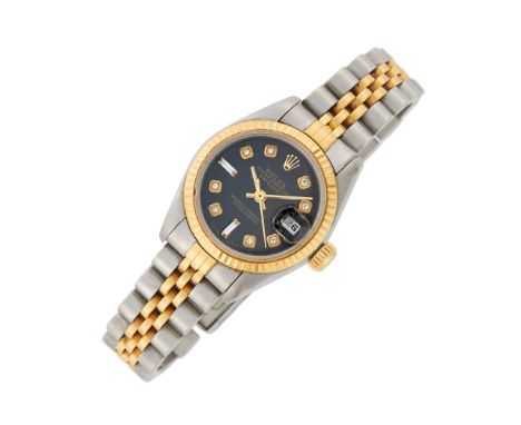 Automatic, round black dial, aftemarket round and baguette diamond markers, sweep seconds, date aperture, fluted bezel, sapph